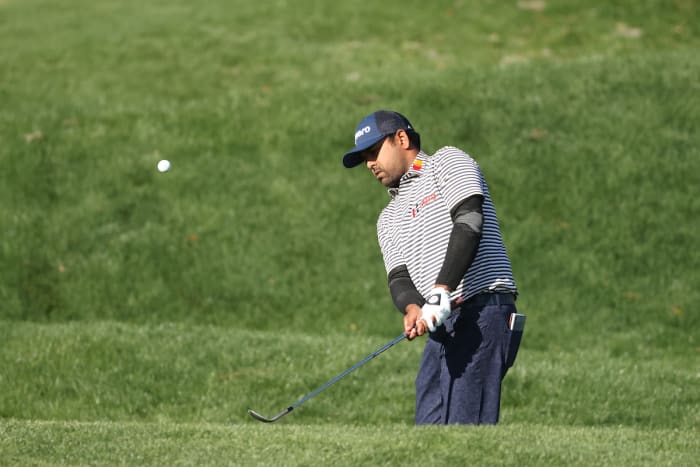 Anirban Lahiri chips during the 2022 Players Championship.